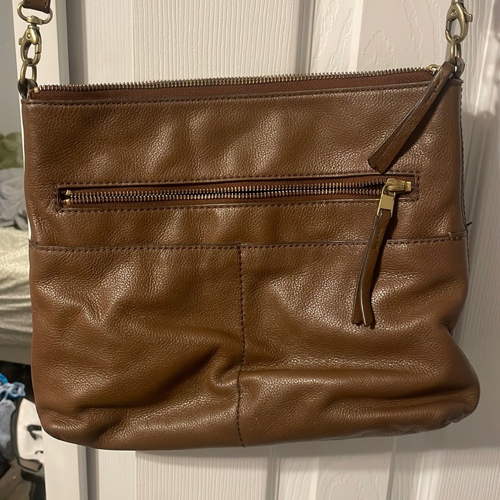 Brown leather fossil bag.